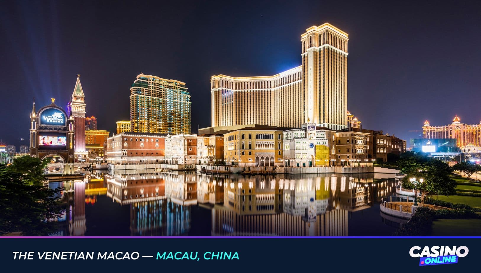 Night view of The Venetian Macao in Macau, China, featuring illuminated Venetian-style architecture reflected in the water.