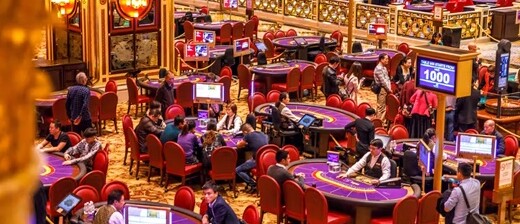 Land-based casino's table games' room.
