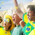 Passional football fans with Brazilian flags and colours.